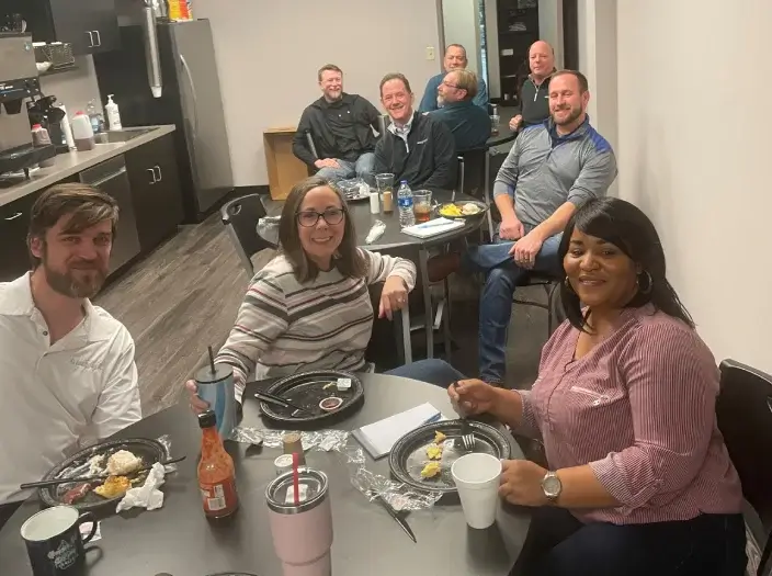 break room workers enjoying food and company