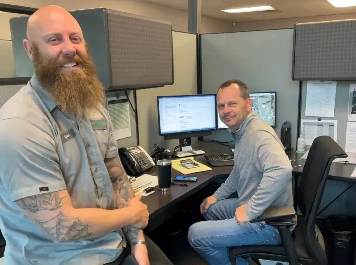 friends in office working together
